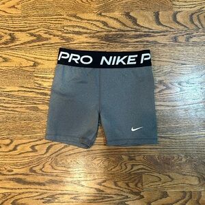 Nike: girls Nike pros dri-fit size large.